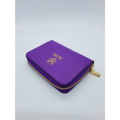Grand portefeuille en cuir grainé violet
