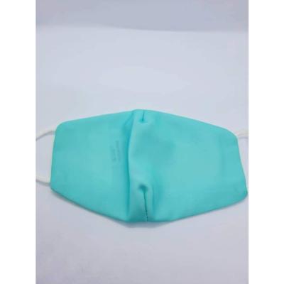 Masque en tissu turquoise